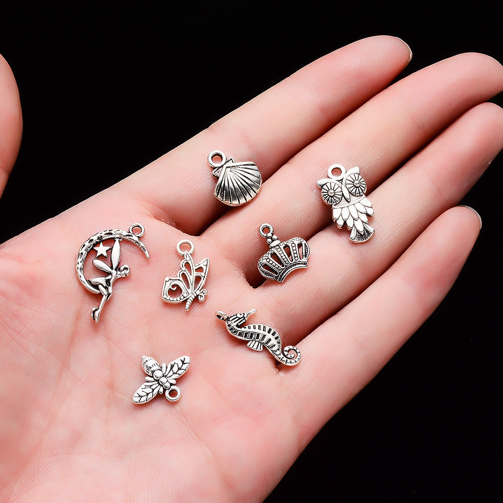 100 Assorted Silver Pendants