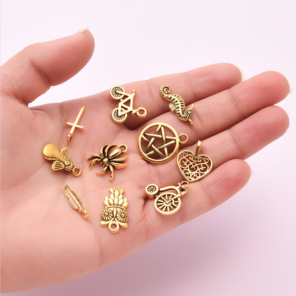 100 Assorted Gold Alloy Pendants