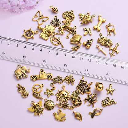 100 Assorted Gold Alloy Pendants