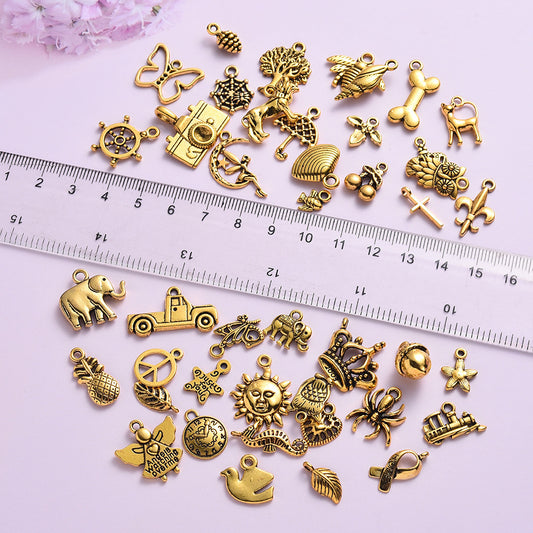 100 Assorted Gold Alloy Pendants
