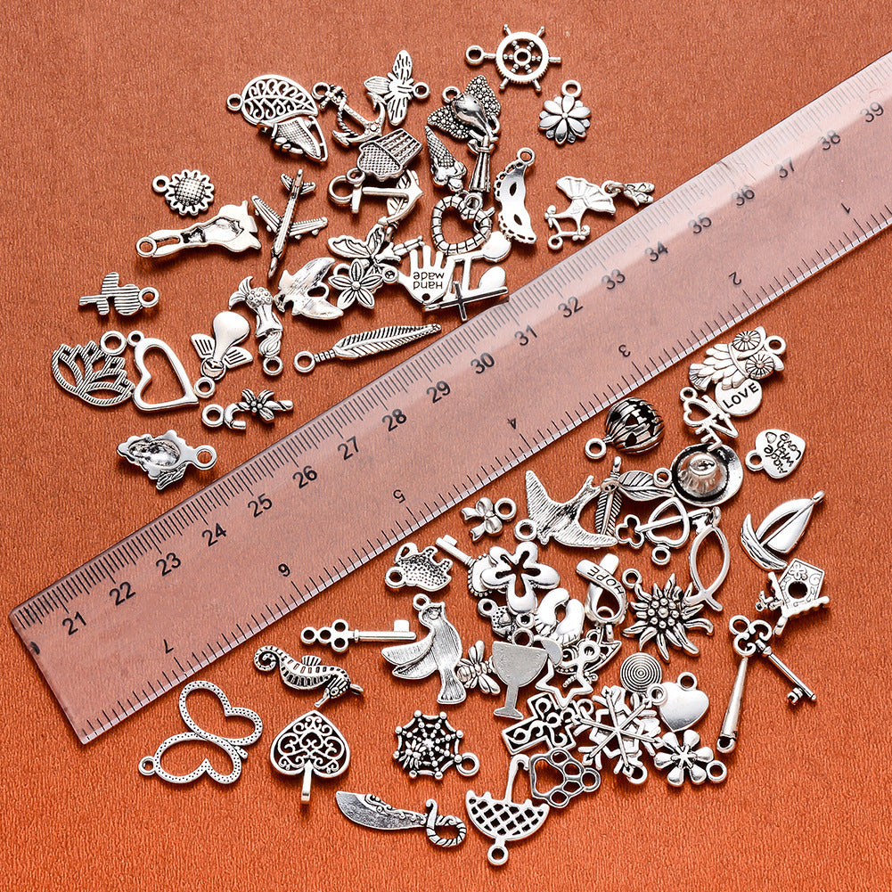 100 Assorted Silver Pendants